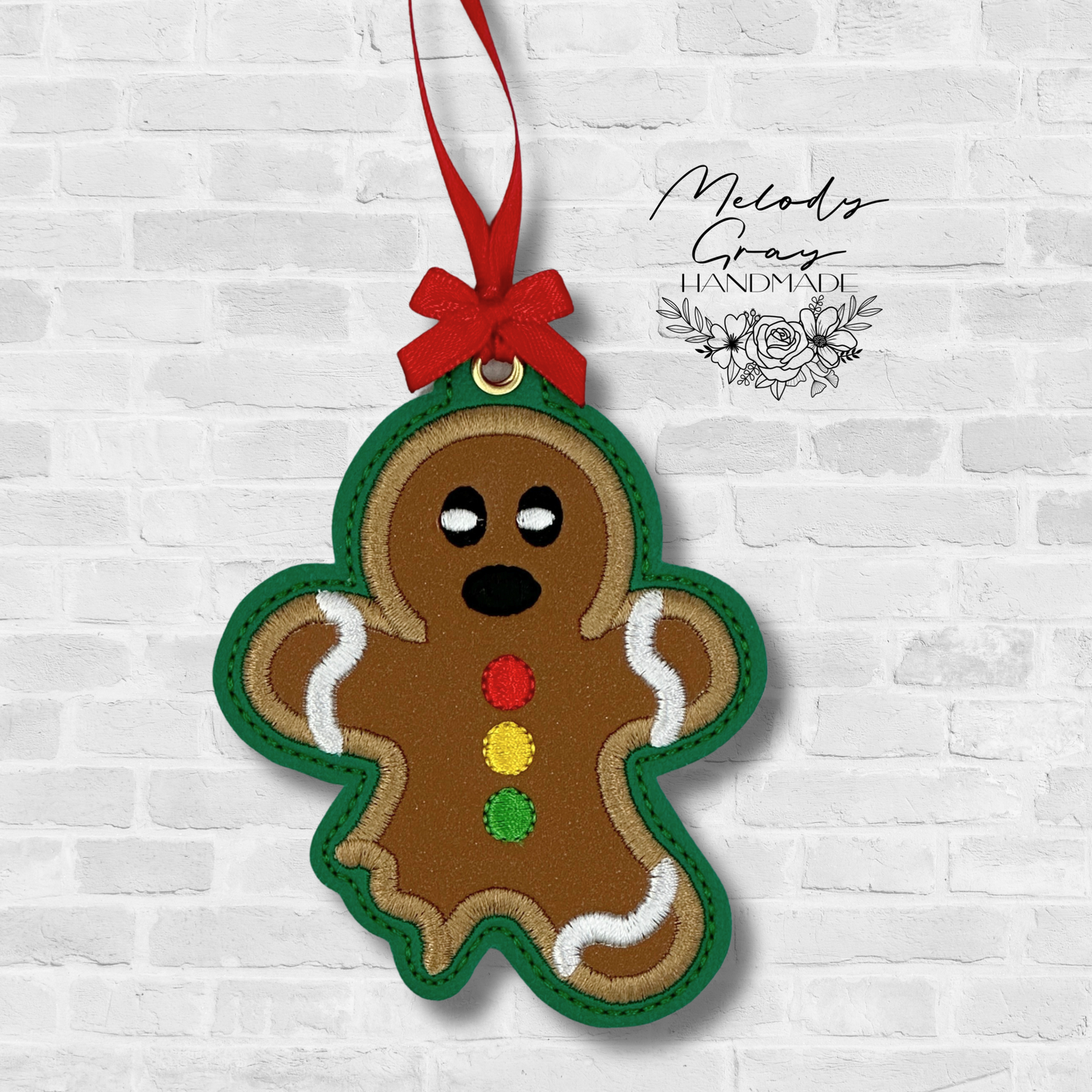 Bitten Gingerbread Man Ornament